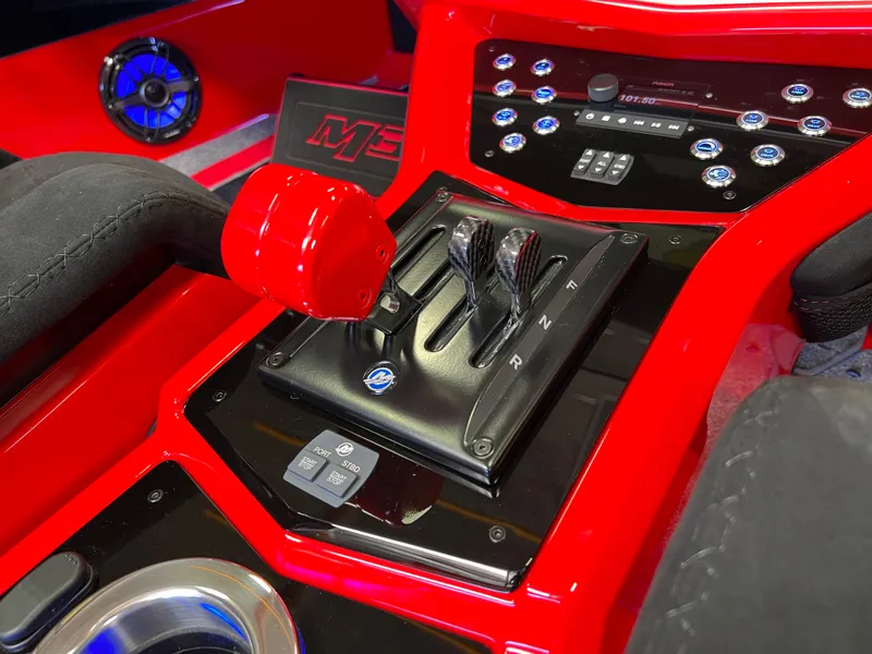 Slide: The Image of 2023 Daves Custom Boats M37R interior with red accents and control panel. - 25