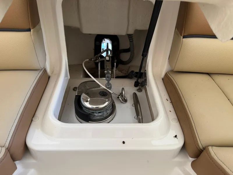 Slide: The Image of 2015 Sea Ray 350 SLX boat interior showing anchor storage compartment. - 18