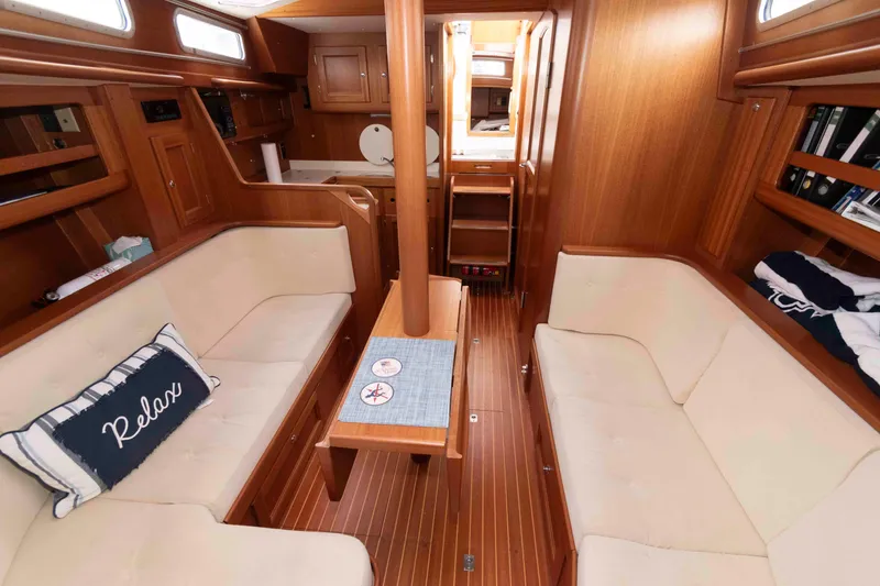 Slide: The Image of Luxurious 2006 Vilm 117 yacht interior with cozy seating and elegant wood finish. - 16