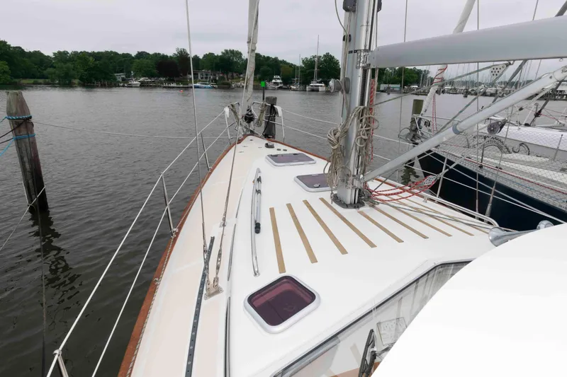 Slide: The Image of Sailboat deck view of 2006 Vilm 117, docked in a marina. - 7