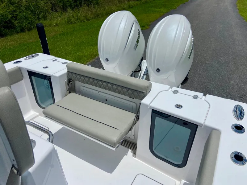 Slide: The Image of 2025 Sportsman Open 262 Center Console with dual engines and comfortable seating. - 13