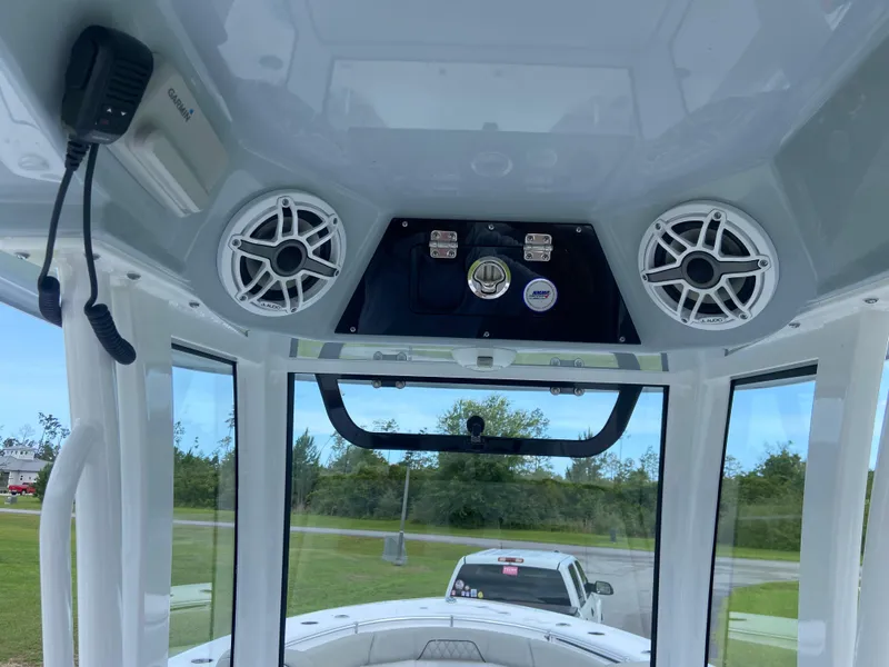 Slide: The Image of 2025 Sportsman Open 262 Center Console interior with speakers and control panel. - 16