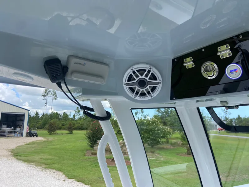 Slide: The Image of 2025 Sportsman Open 262 Center Console interior with speaker and control panel. - 17