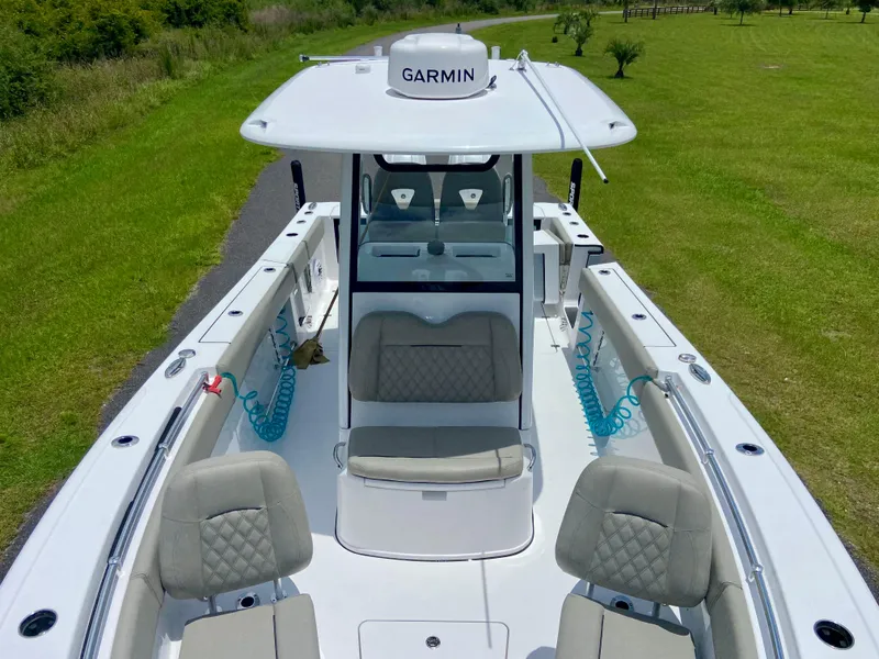 Slide: The Image of 2025 Sportsman Open 262 Center Console boat with Garmin equipment, viewed from above. - 9
