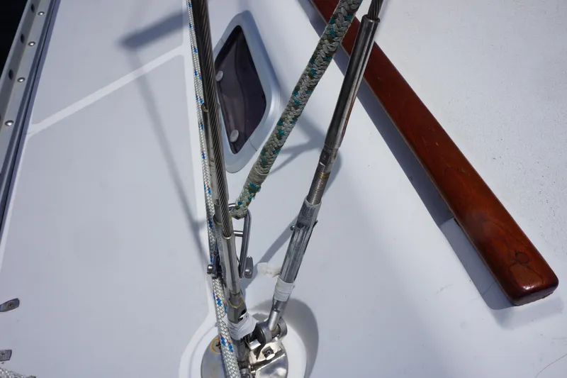 Slide: The Image of Deck of 1993 Hunter 35.5 sailboat with rigging and wooden handrail. - 17