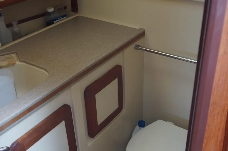 Slide: The Image of 1993 Hunter 35.5 yacht bathroom with sink and toilet. - 30