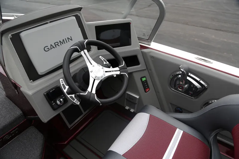 Slide: The Image of 2025 Ranger 621FS Pro boat cockpit with Garmin display and modern steering wheel. - 4