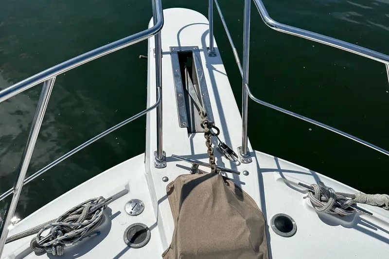 Slide: The Image of Bow of 1988 Carver 38 Aft Cabin with anchor and ropes. - 14