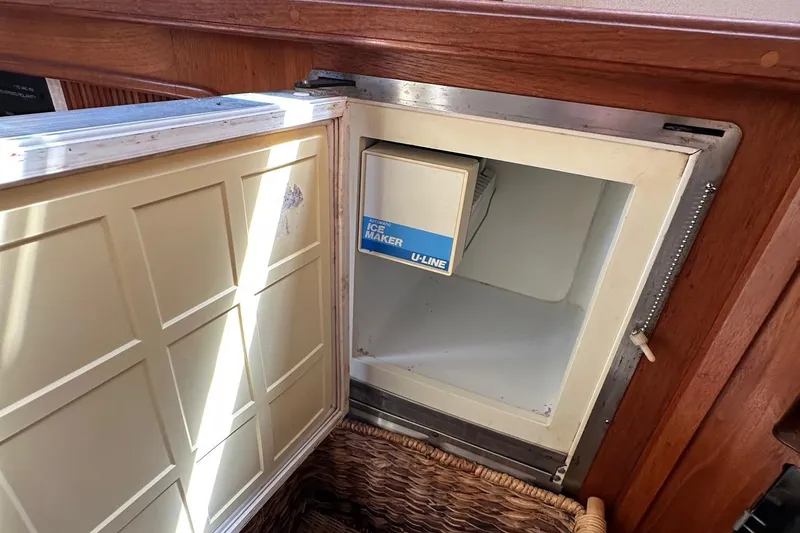 Slide: The Image of Open U-Line ice maker in 1988 Carver 38 Aft Cabin yacht interior. - 28