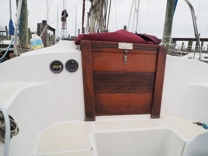 Slide: The Image of Cockpit of 1984 Endeavour 33 sailboat with wooden hatch and gauges. - 12