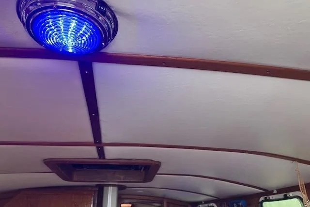 Slide: The Image of Ceiling of 1984 Endeavour 33 boat with blue LED light fixture. - 35