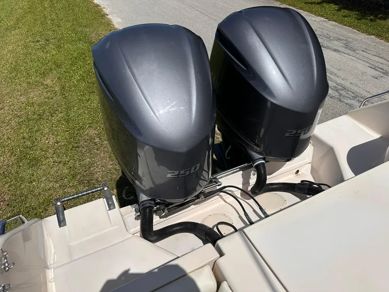 Slide: The Image of Twin 250 horsepower engines on a 2011 Grady-White Freedom 275 boat. - 12