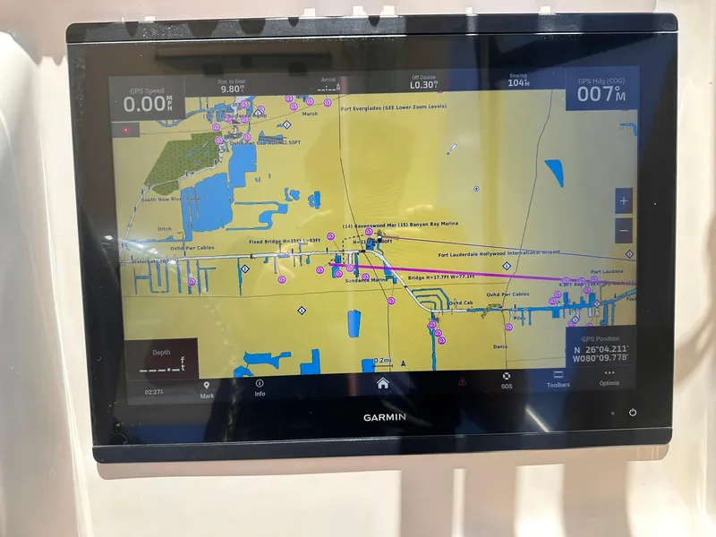 Slide: The Image of Garmin GPS display on 2011 Grady-White Freedom 275 boat, showing navigational map. - 23