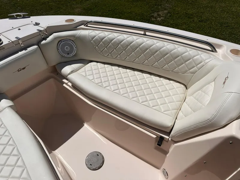 Slide: The Image of Luxurious seating on 2011 Grady-White Freedom 275 boat with quilted upholstery. - 25