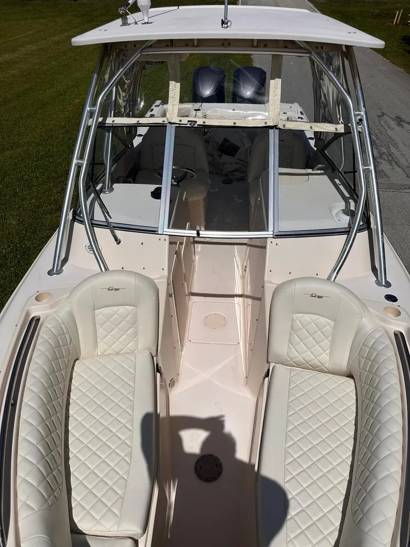 Slide: The Image of 2011 Grady-White Freedom 275 boat with dual seating and helm, viewed from above. - 29