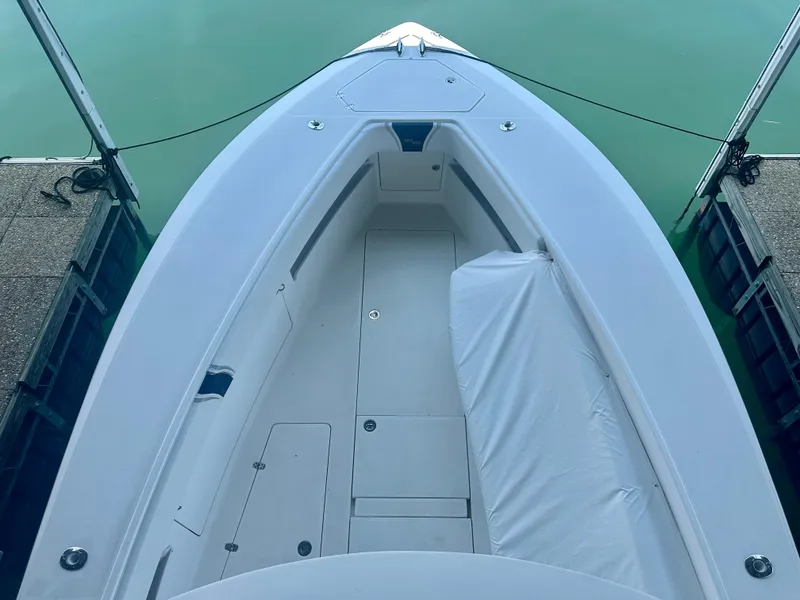 Slide: The Image of 2008 SeaVee 390B boat deck, docked, with clean, spacious layout. - 27