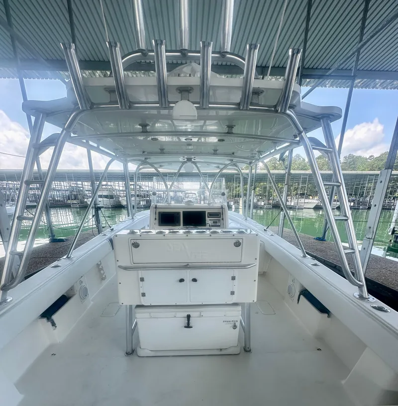 Slide: The Image of 2008 SeaVee 390B boat interior with helm station and overhead canopy. - 28