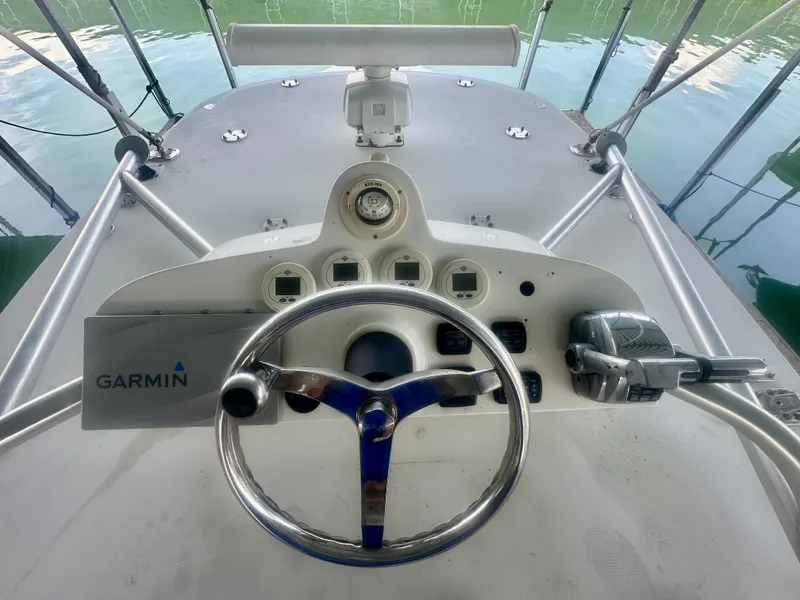 Slide: The Image of 2008 SeaVee 390B boat helm with Garmin navigation system and steering wheel. - 34