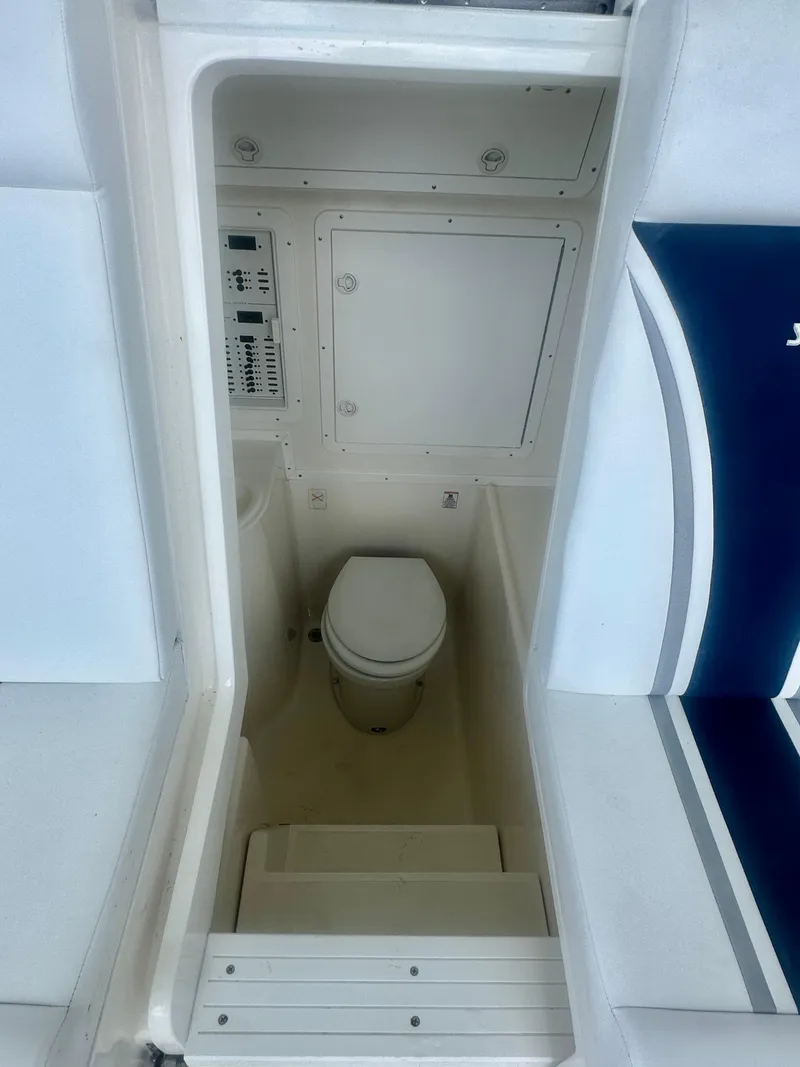 Slide: The Image of 2008 SeaVee 390B boat interior with compact marine toilet. - 39