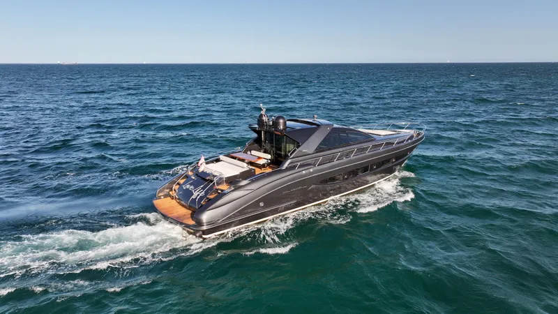 Slide: The Image of 2009 Riva 68' EGO SUPER yacht cruising on open sea. - 10