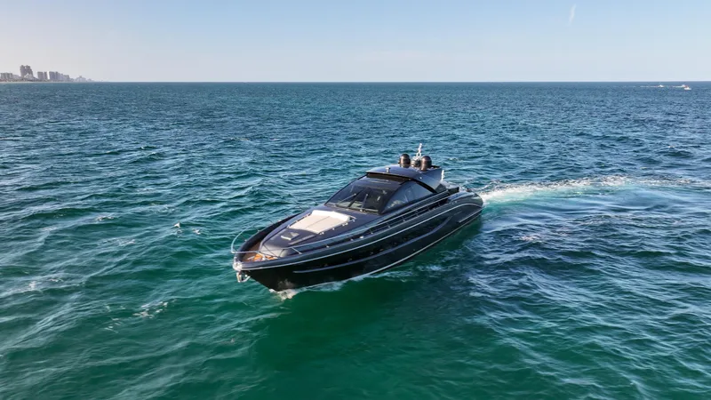 Slide: The Image of Luxurious 2009 Riva 68' EGO SUPER yacht cruising on open sea. - 13