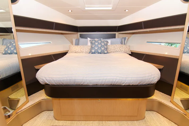 Slide: The Image of Luxurious bedroom interior of 2009 Riva 68' EGO SUPER yacht with elegant bedding. - 19