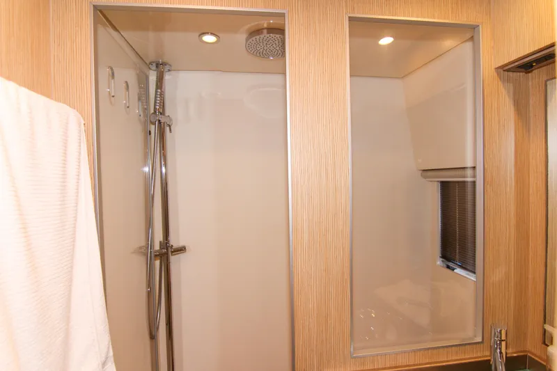 Slide: The Image of Luxurious bathroom shower in 2009 Riva 68' EGO SUPER yacht, featuring modern fixtures. - 22