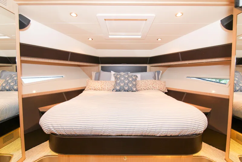 Slide: The Image of Luxurious bedroom interior of 2009 Riva 68' EGO SUPER yacht with elegant bedding. - 28