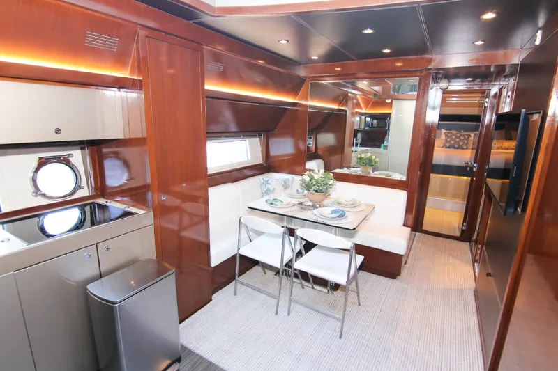 Slide: The Image of Luxurious interior of 2009 Riva 68' EGO SUPER yacht with elegant dining area. - 30