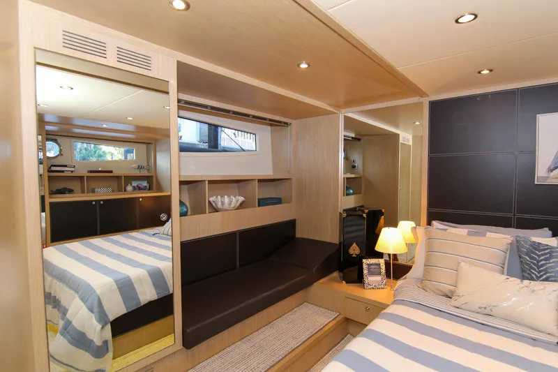 Slide: The Image of Luxurious interior of 2009 Riva 68' EGO SUPER yacht with elegant bedroom and seating area. - 32