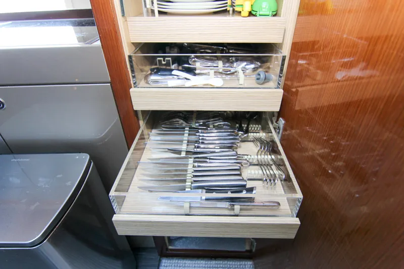 Slide: The Image of Cutlery drawer in a 2009 Riva 68' EGO SUPER yacht kitchen. - 33