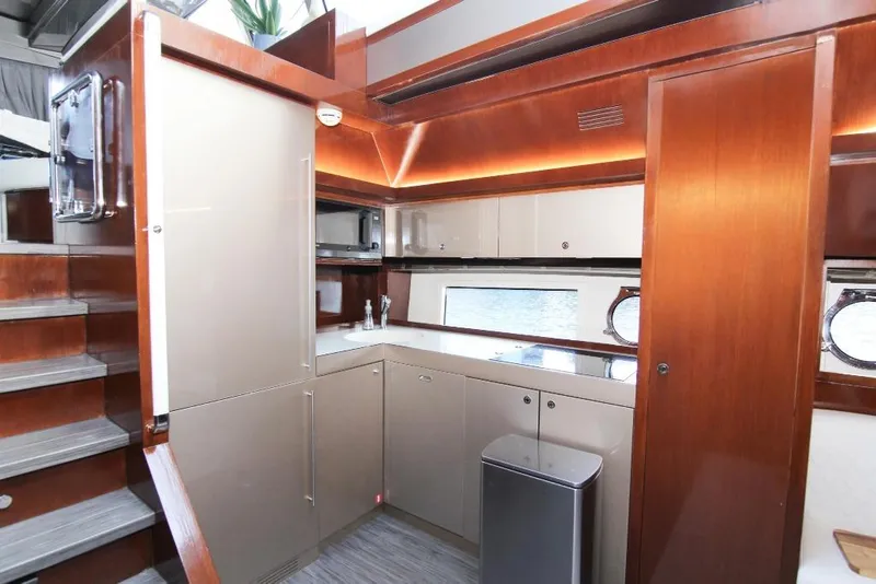 Slide: The Image of Luxurious kitchen interior of 2009 Riva 68' EGO SUPER yacht with modern cabinetry. - 35