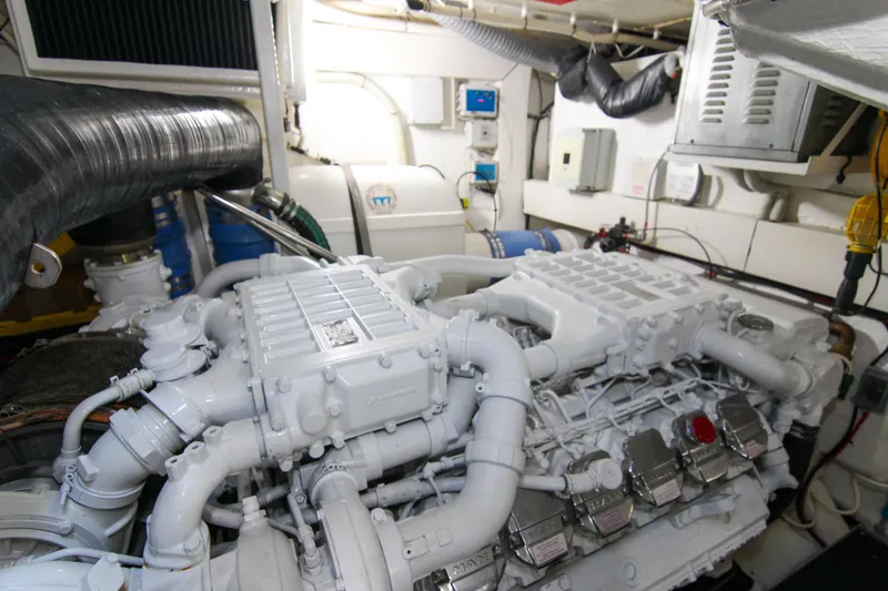 Slide: The Image of Engine room of 2009 Riva 68' EGO SUPER yacht, showcasing complex machinery and piping. - 40