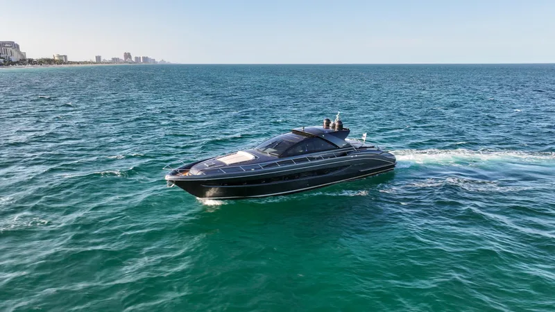 Slide: The Image of Luxurious 2009 Riva 68' EGO SUPER yacht cruising on open sea. - 5