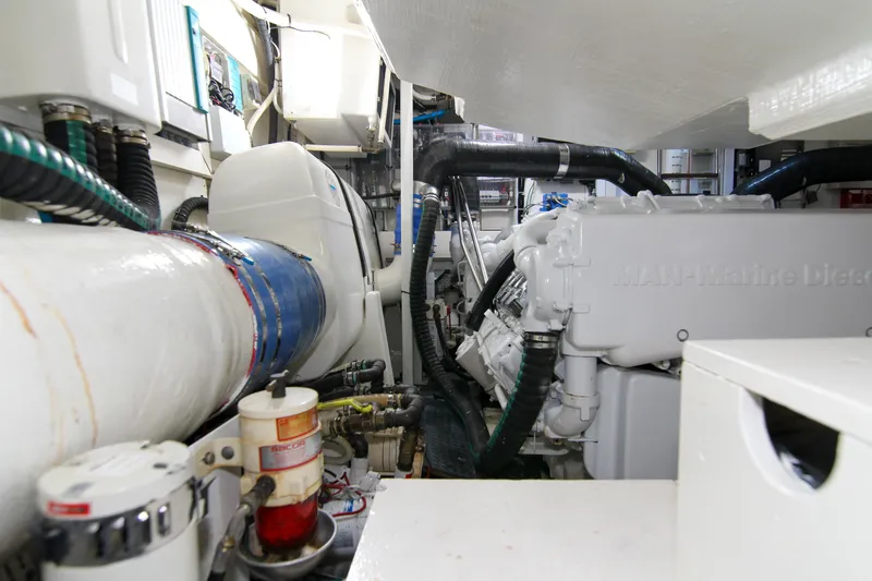 Slide: The Image of Engine room of 2009 Riva 68' EGO SUPER yacht, showcasing mechanical components and systems. - 56