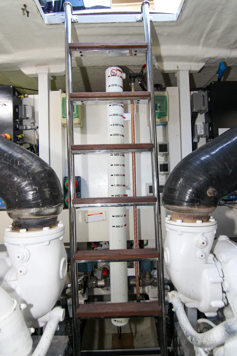 Slide: The Image of Engine room of 2009 Riva 68' EGO SUPER yacht with ladder and machinery. - 65