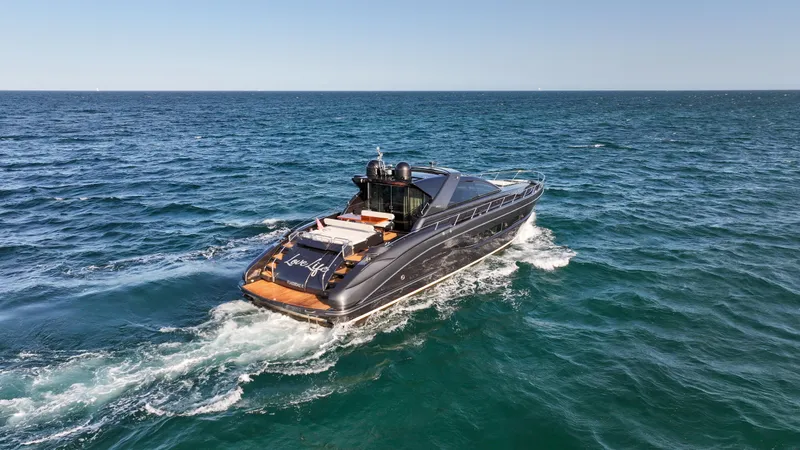 Slide: The Image of Luxury 2009 Riva 68' EGO SUPER yacht cruising on open sea. - 9