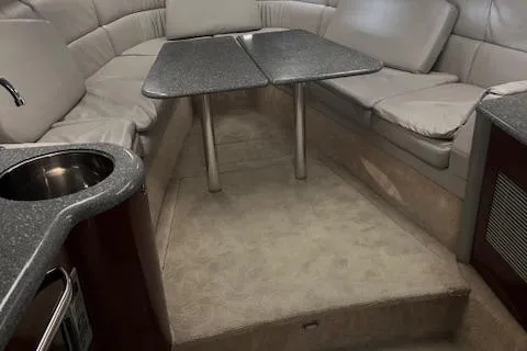 Slide: The Image of 2005 Formula 400 SS cabin interior with seating, table, and kitchenette. - 14