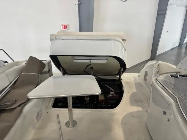 Slide: The Image of 2005 Formula 400 SS boat interior with open engine compartment and seating area. - 6