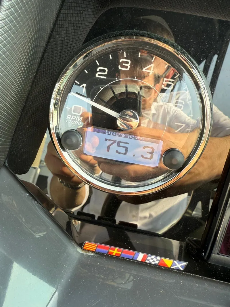Slide: The Image of Close-up of a 2023 Monterey M65 tachometer displaying 75.3 engine hours. - 20