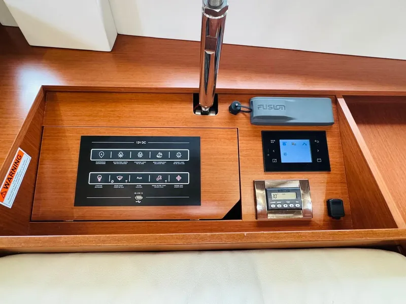 Slide: The Image of Control panel of a 2020 Beneteau Oceanis 51.1 yacht with Fusion audio system. - 27