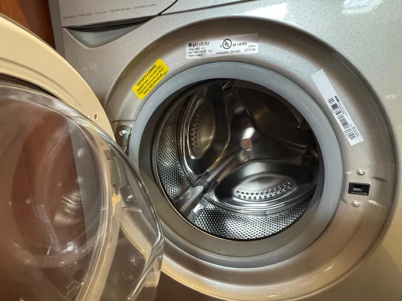 Slide: The Image of Open washing machine door on a Beneteau Oceanis 51.1 yacht, 2020 model. - 41