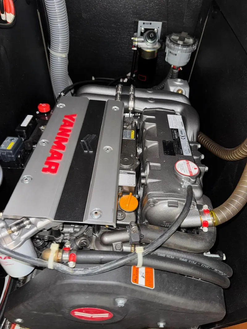 Slide: The Image of Yanmar engine in a 2020 Beneteau Oceanis 51.1 sailboat, showcasing mechanical components. - 49