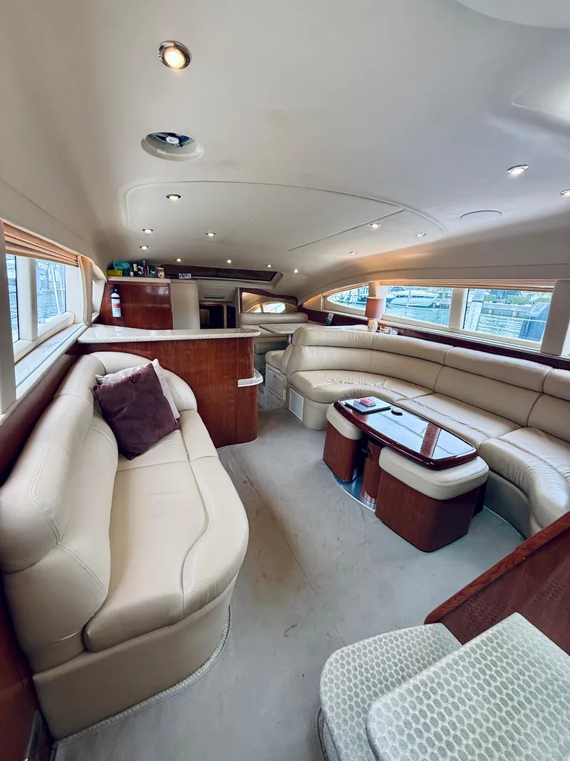 Slide: The Image of Luxurious interior of a 2003 Sea Ray 480 Motor Yacht with plush seating and elegant design. - 40