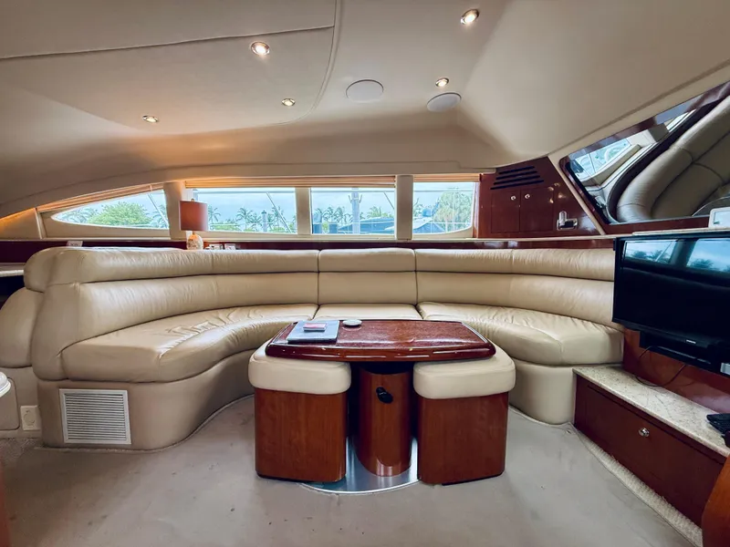 Slide: The Image of Luxurious interior of 2003 Sea Ray 480 Motor Yacht with plush seating and elegant wood finishes. - 46