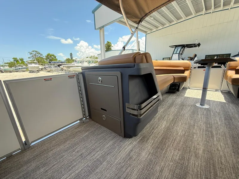 Slide: The Image of 2026 Bennington 24 MSB pontoon boat interior with luxurious seating and modern design. - 14