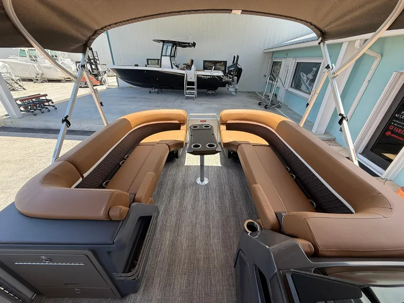 Slide: The Image of 2026 Bennington 24 MSB pontoon boat with spacious seating and modern design. - 18