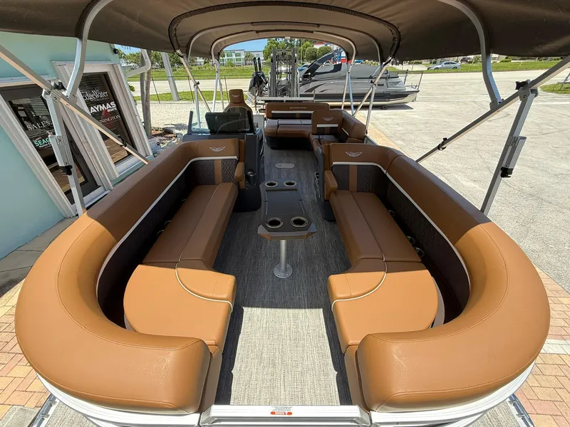 Slide: The Image of 2026 Bennington 24 MSB pontoon boat with spacious seating and elegant interior design. - 21