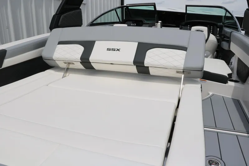 Slide: The Image of 2025 Chaparral 267 SSX boat interior with luxurious seating and modern design. - 13