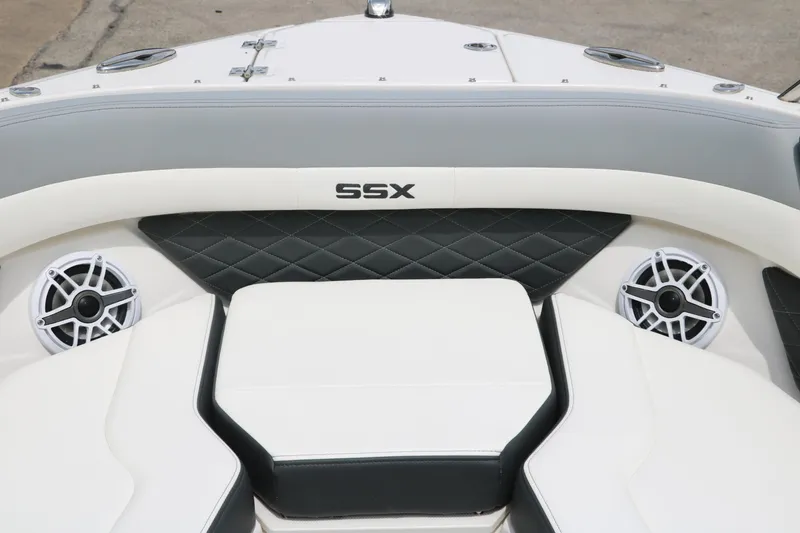 Slide: The Image of 2025 Chaparral 267 SSX boat interior with SSX logo and speakers. - 20